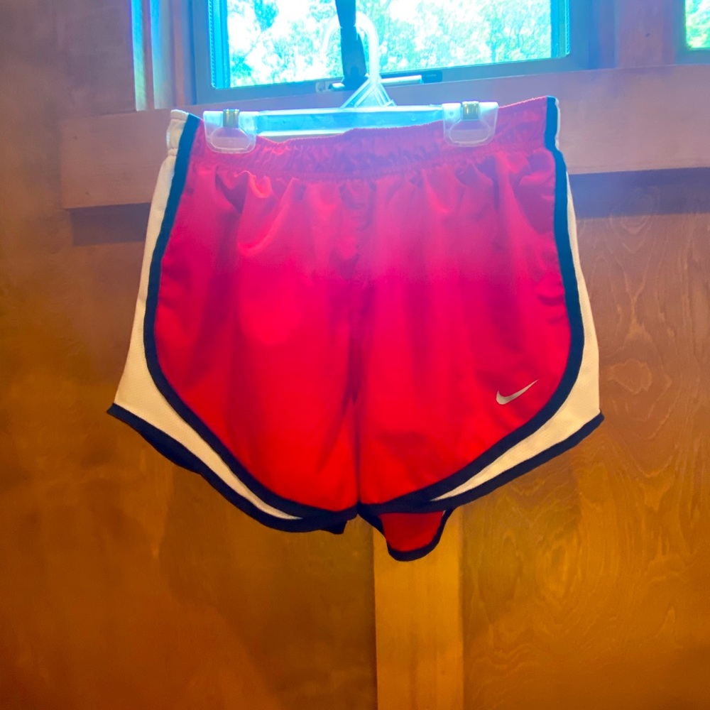 Red Nike shorts